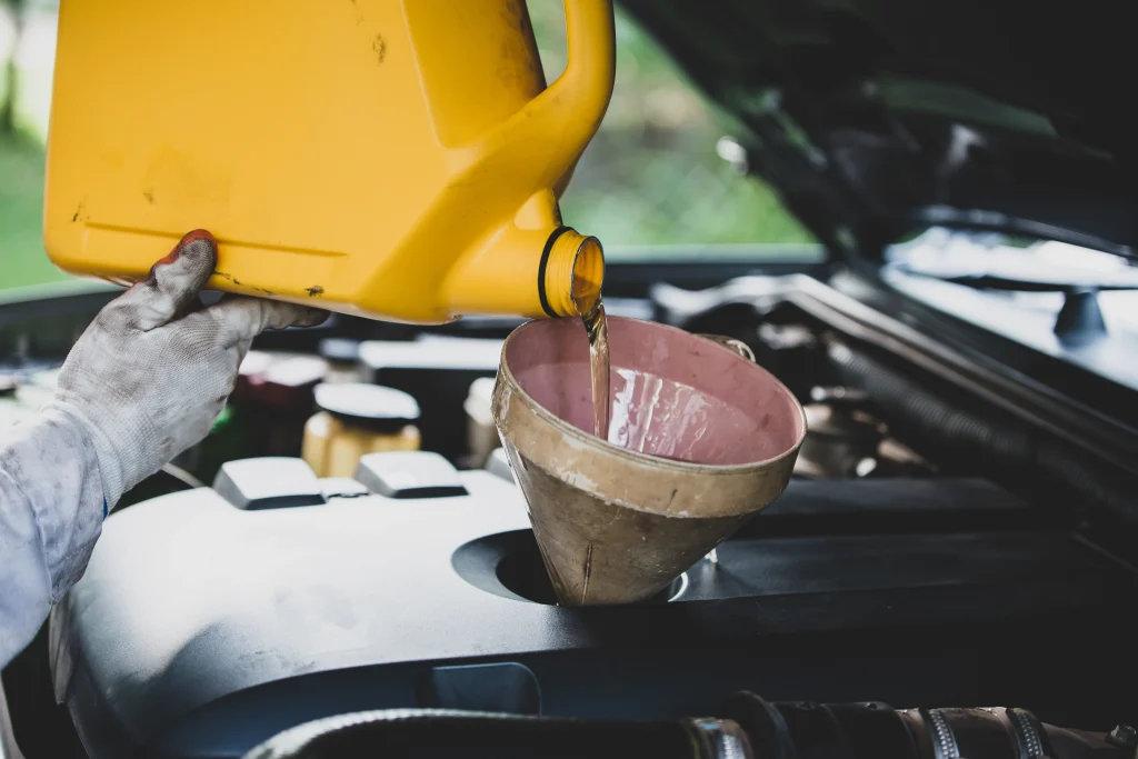 replacing fresh oil into engine